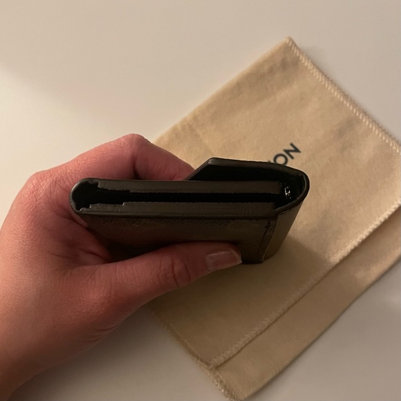 Authentic Louis Vuitton Reverse Giant Monogram Zoe Wallet - Picture 5 of 10